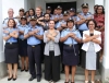 Vise Ministra Solidariedade Sosial no Inkluzaun, Signi Candrawati Verdial foto hamutuk ho Investigador ba kazu labarik no Ema ho Defisiensia, husi Polisia Nasional Timor-Leste. Foto:Media Gabineti MSSI.