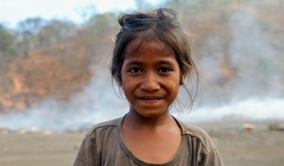 Vanya, 8, lives just outside the dump and says she's been working here all her life Source: Ian Lloyd Neubauer/Al Jazeera